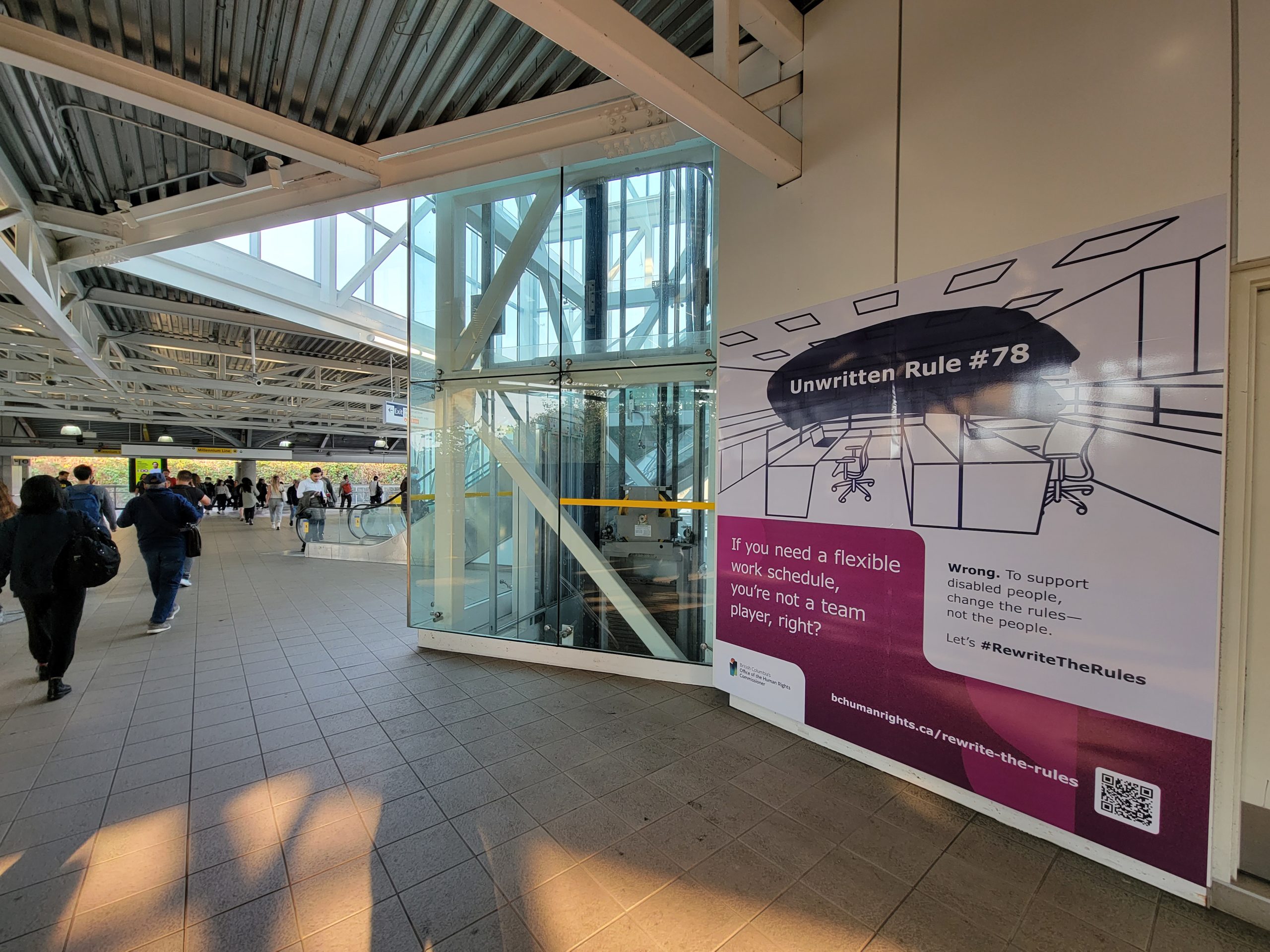 Photo of #RewriteTheRules mural at Commercial-Broadway Skytrain station in Vancouver