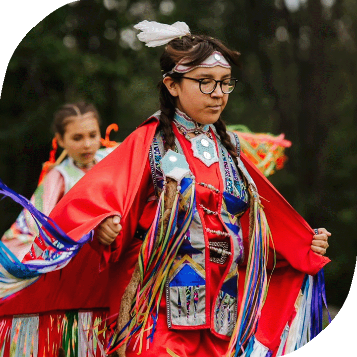 A young Indigenous girl practices ribbon dancing in Chetwynd