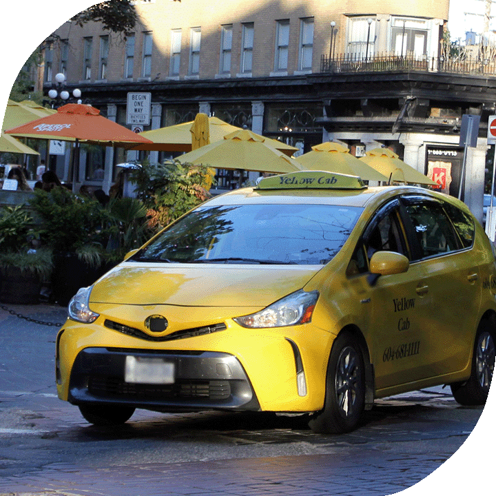 A yellow cab is parked in Gastown, in Vancouver, B.C.