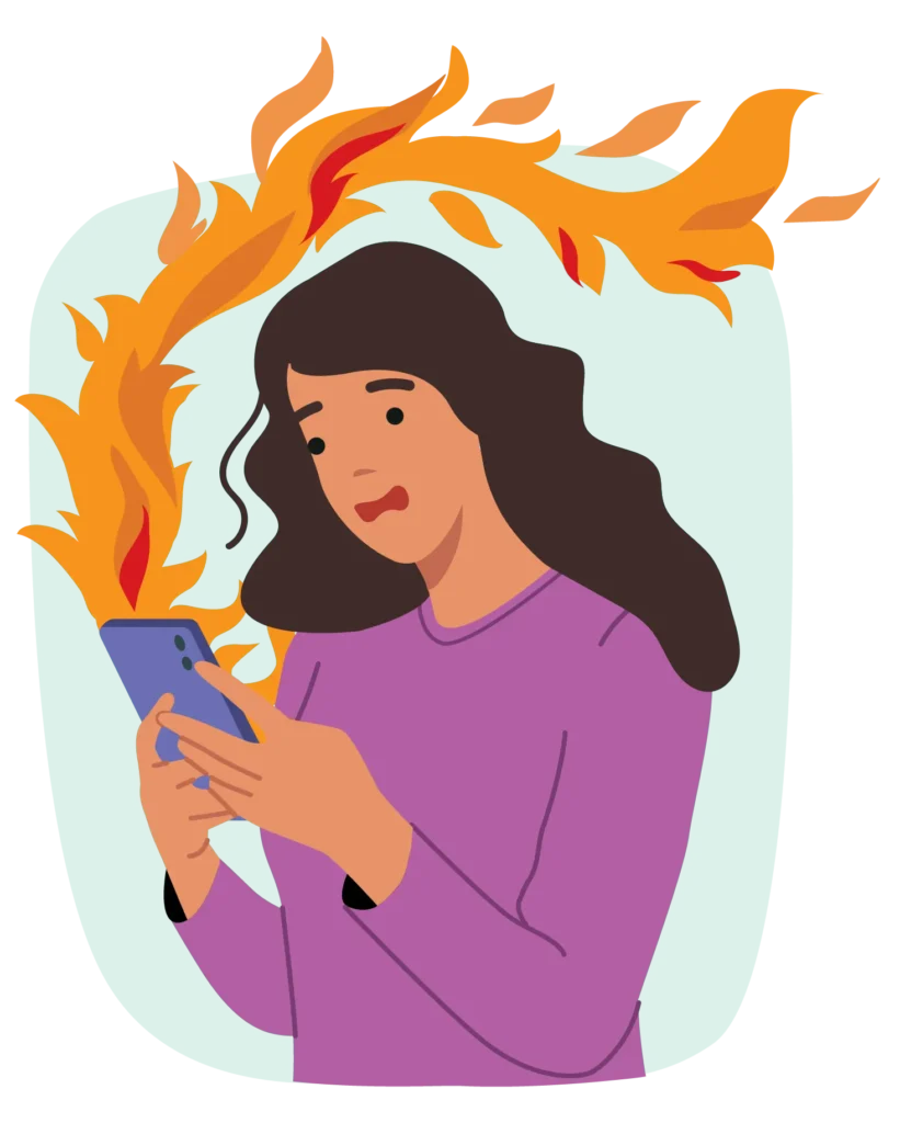 Woman holding her cellphone while a blazing fire grows out of its screen