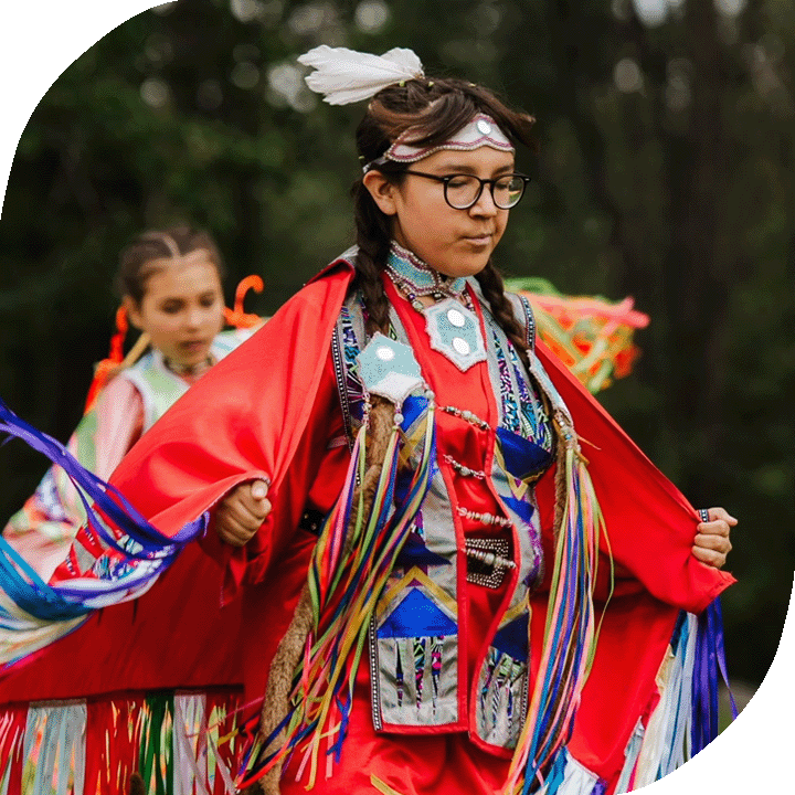 A young Indigenous girl practices ribbon dancing in Chetwynd