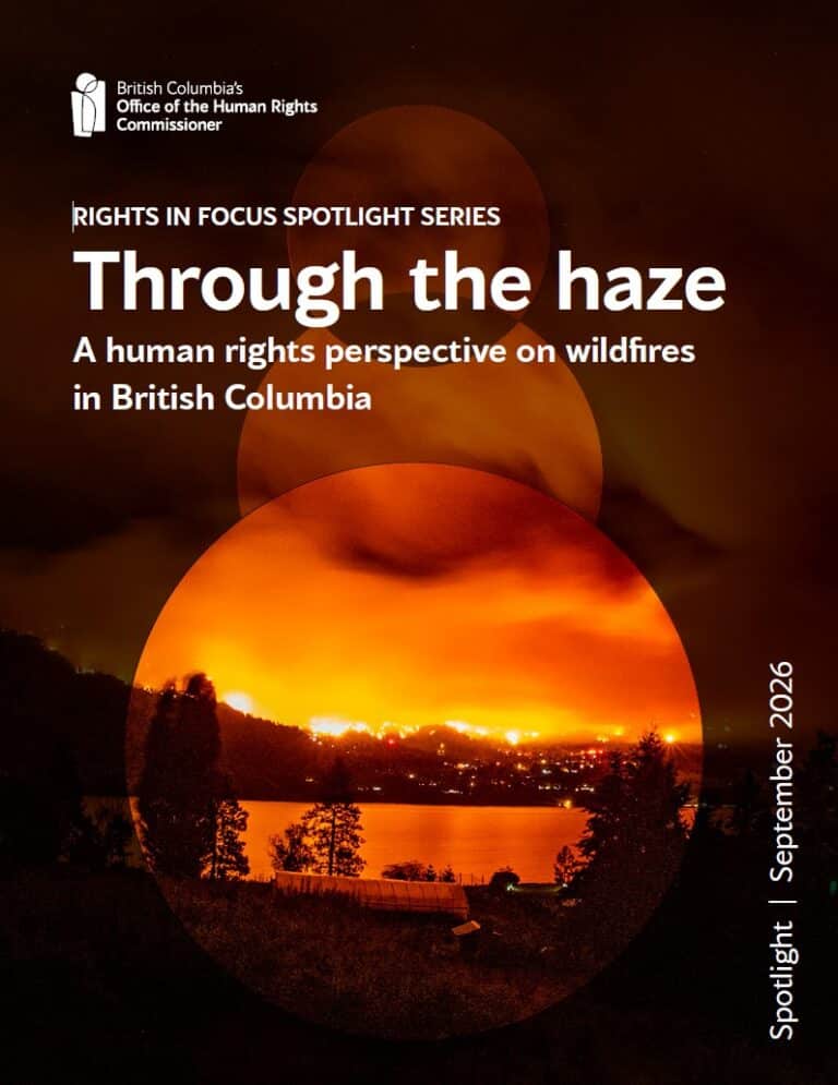 A forest fire burns through the night in the Okanagan valley, releasing smoke and haze into the sky.